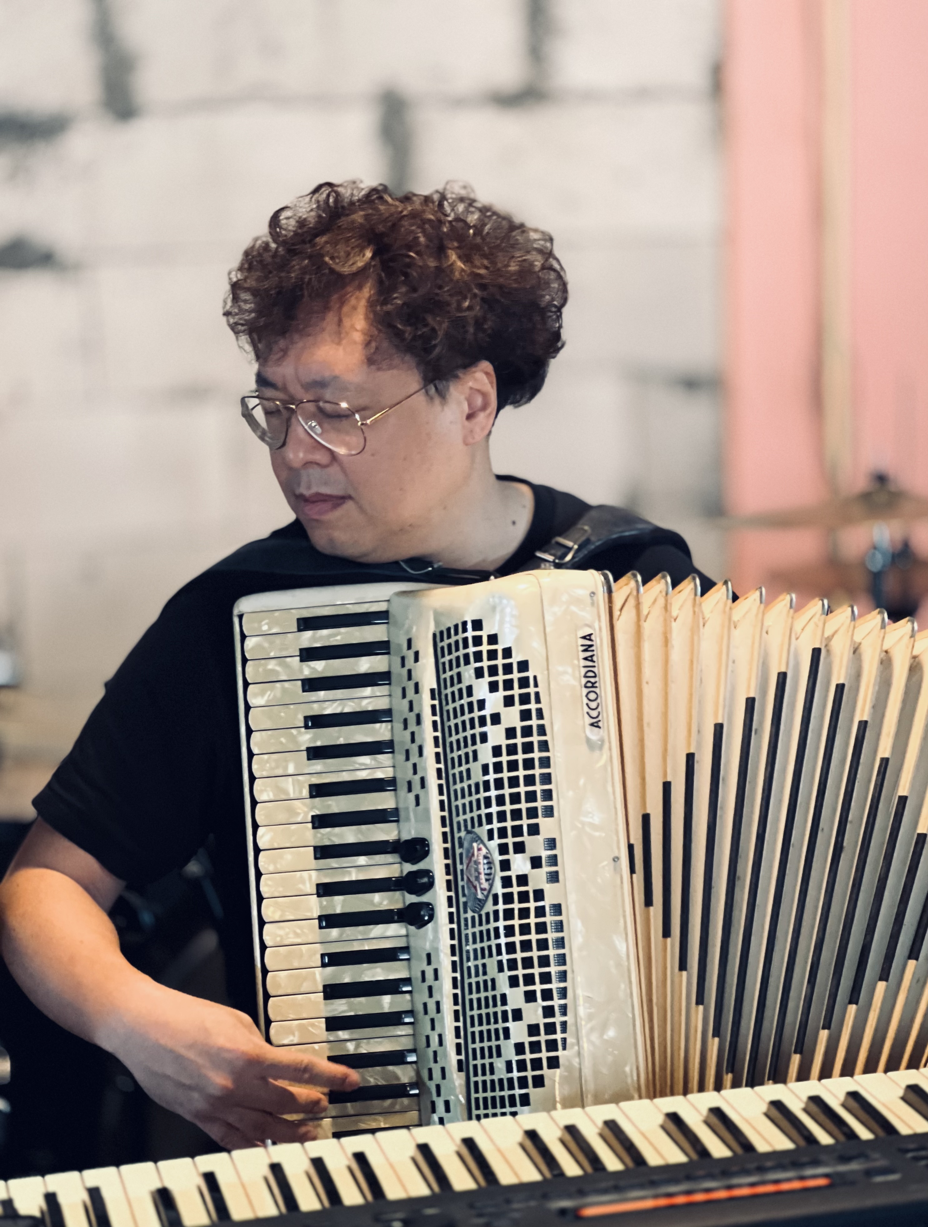Ryui performing on accordion